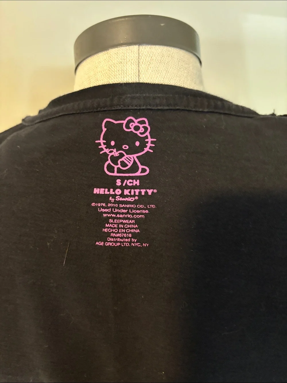 Hello Kitty Black Tee with Pink and Purple Bow